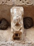 Olmo, El. Virgen del Olmo. Canecillo figurado