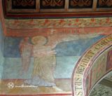 Oberzell. Saint Georg. Pintura de un ángel en una enjuta del arco de triunfo