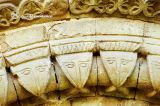 Aramil. San Esteban.Detalle de caras