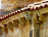 Castañeda.Santa Cruz.Canecillos del presbiterio