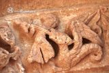 Abajas. Santa Maria la Real.Detalle de arquivolta: San Miguel luchando contra el dragón