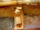 Nogales de Pisuerga.San Juan Bautista.Canecillo con monje