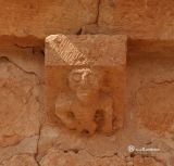 Aguilera. San Martin. Detalle de canecillo figurado