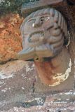 Tera. Nuestra Señora del Carmen.Detalle de la cara del canecillo
