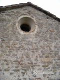 Valmanya. Sant Miquel. Oculo en la fachada oeste