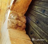 Aguilar de Codes. Ermita de San Bartolomé. Portico sur. Mocheta, leones con cordero