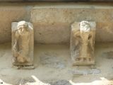 Carcamo. San Juan Bautista. Canecillos figurados del ábside