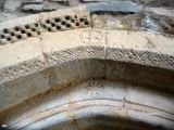 Jokano. San Martin. Detalle de claves con cruz y flor octapétala