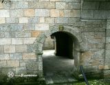 Gatäo. São João Baptista. Puerta con cara en la clave